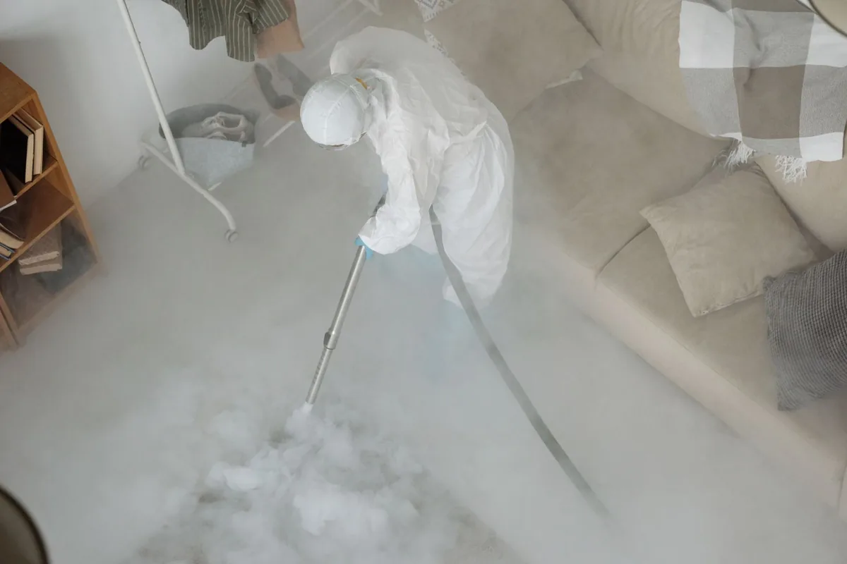 Biohazard cleanup technician in protective equipment, Cranbury, NJ